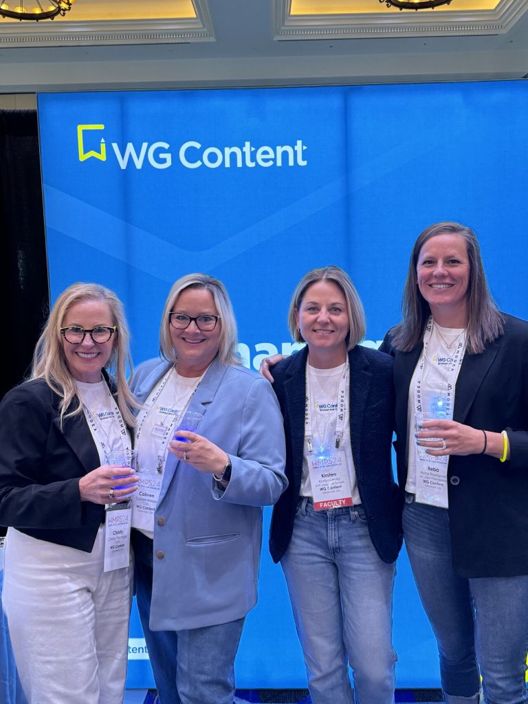 Picture of the WG Content team at a tradeshow. 